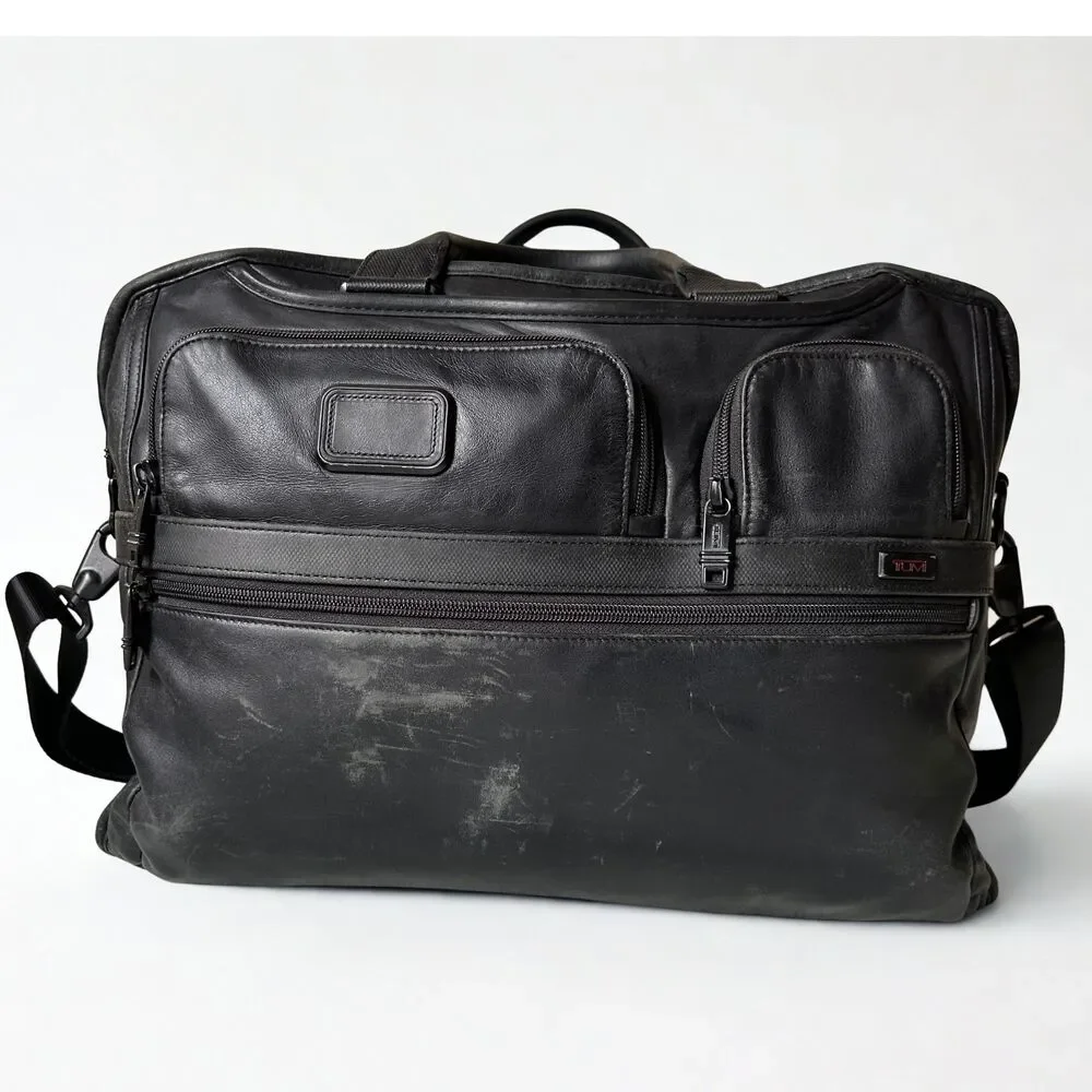 TUMI Leather Laptop Briefcase Expandable Work Bag Black – Wear & Small Hole